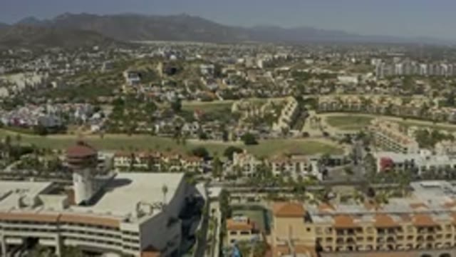 LOS CABOS MEXICO-2020: Beautiful Tall And Short Buildings Sitting On The Hillside