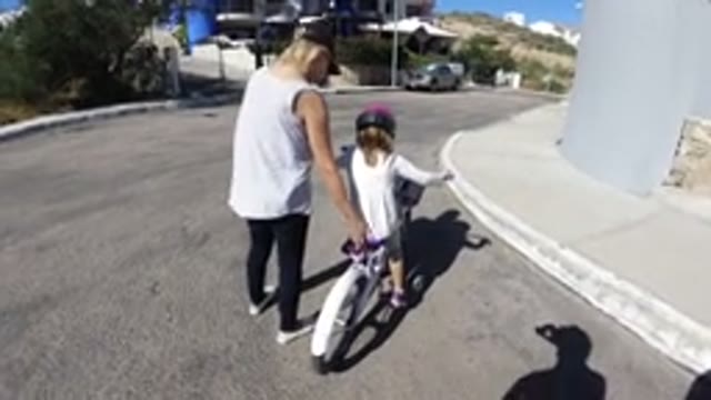 SAN JOSE DEL CABO MEXICO-2020: Mom Teaches Child to Cycle in Heartwarming Home Movie