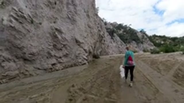 SAN JOSE DEL CABO MEXICO-2020: Hiking With Woman And Dog On A Trail Next To