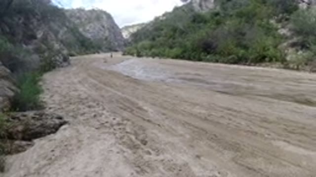 SAN JOSE DEL CABO MEXICO-2020: A View Of A Dirt Path With Mountains And Grass