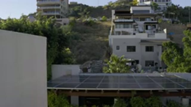 LOS CABOS MEXICO-2020: White Houses And Buildings On A Grassless Hill With