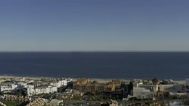 LOS CABOS MEXICO-2020: A Beach With Beautiful Township View From A Hill Top