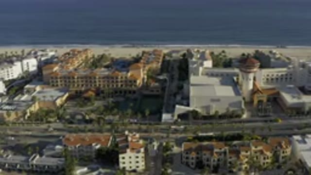 LOS CABOS MEXICO-2020: Top View Of A Township With Fast Moving Vehicles On The