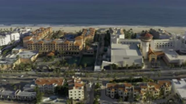LOS CABOS MEXICO-2020: Cars Driving Through Street Traffic Through Lots Of