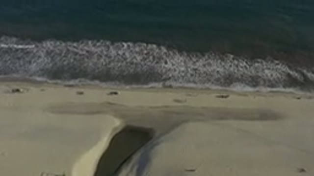LOS CABOS MEXICO-2020: Sea Waves Waving Smoothly To Reach Foreshore Sand Again