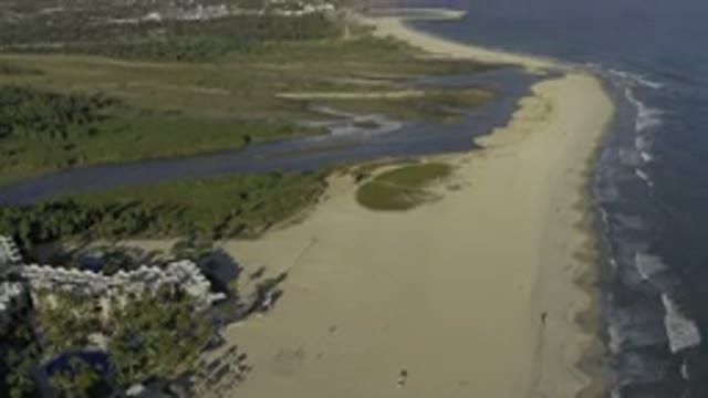 LOS CABOS MEXICO-2020: View Of The Beach Where The River Meets The Ocean