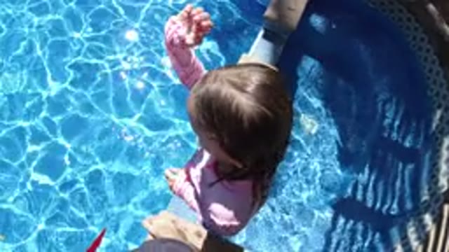 SAN JOSE DEL CABO MEXICO-2020: Girl and Friend Playing Pool, Diving and Swimming in Sun