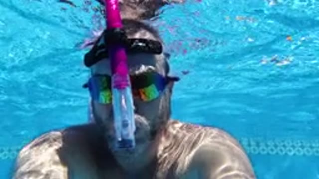 SAN JOSE DEL CABO MEXICO-2020: Middle-Aged Man Snorkelling In The Swimming Pool