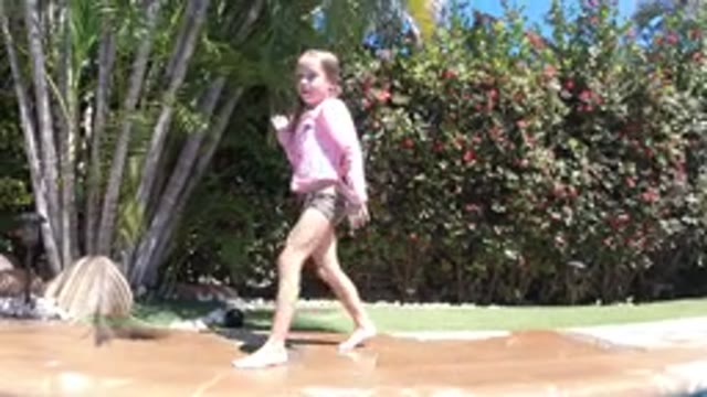 SAN JOSE DEL CABO MEXICO-2020: A Kid Just Got Out Of The Pool And Is Shivering