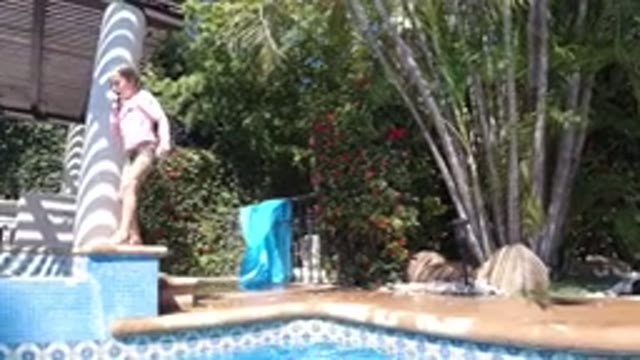 SAN JOSE DEL CABO MEXICO-2020: Girl Getting Ready To Jump In A Pool To Save Her