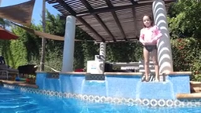 SAN JOSE DEL CABO MEXICO-2020: Cute Girl Thinking Leave The Pool At Glance To