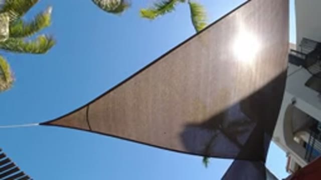 SAN JOSE DEL CABO MEXICO-2020: Slightly Slack Triangular Sail Shade Awning In A