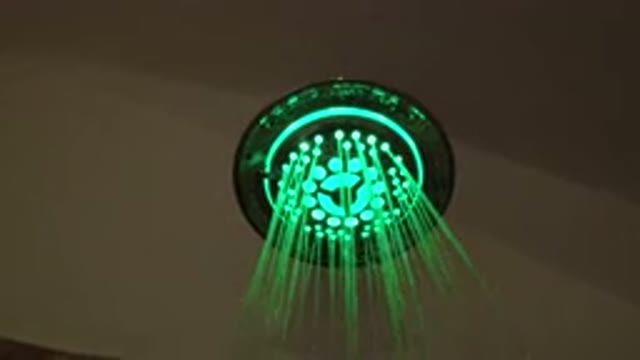 SAN JOSE DEL CABO MEXICO-2020: LED Lighted Shower Lighting Up A Dark Room