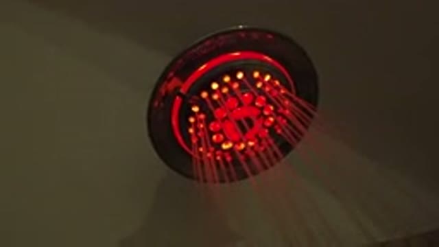 SAN JOSE DEL CABO MEXICO-2020: Shower Head With Red Light Spraying Water