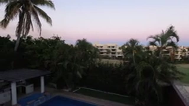 LOS CABOS MEXICO-2020: A Building Top View Of Surrounding Area With Coconut Trees