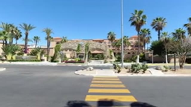 LOS CABOS MEXICO-2020: Single Car Passing Through Empty Street On A Clear Day