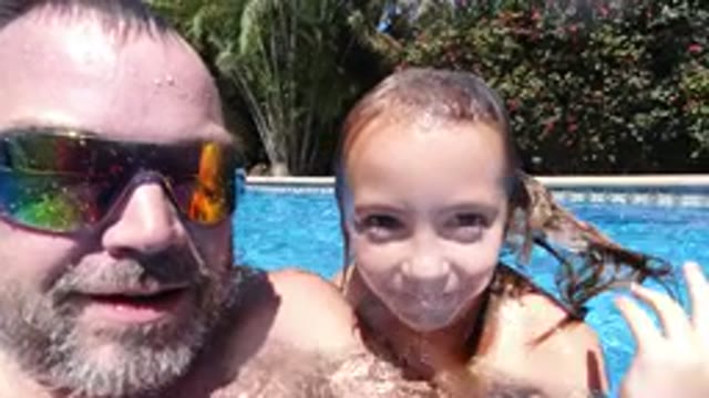 LOS CABOS MEXICO-2020: Two People Together In A Pool Looking Directly Into A