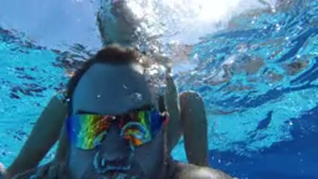 LOS CABOS MEXICO-2020: Father And Daughter Having Fun Swimming