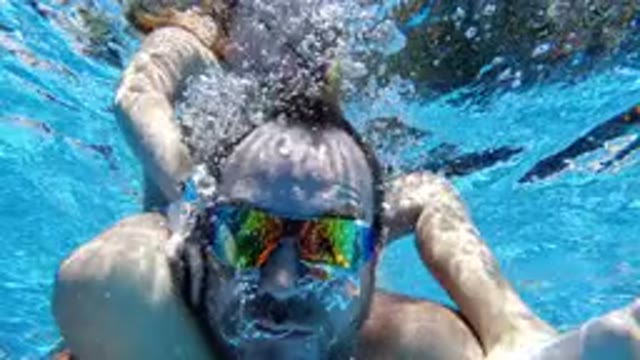 LOS CABOS MEXICO-2020: Underwater Marco Polo Game in Swimming Pool With Dad and Kid