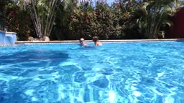 LOS CABOS MEXICO-2020: Father And Daughter Having Fun At Their House Pool While