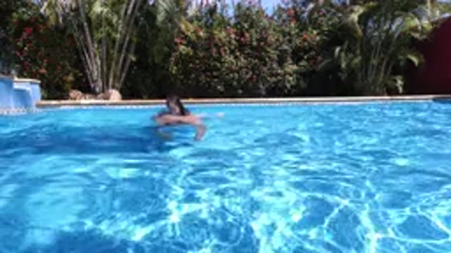 LOS CABOS MEXICO-2020: Man With Little Girl In The Pool Teaching Her How To Swim