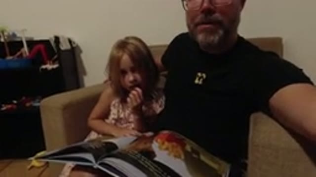 LOS CABOS MEXICO-2020: Father Films Daughter Reading a Magazine