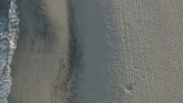 LOS CABOS MEXICO-2020: Top Running View Of A White Sand Beach With White Bubble