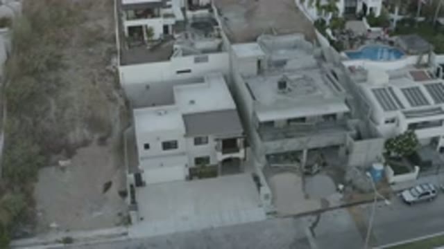 LOS CABOS MEXICO-2020: The Camera Captures The View From Above The Light Brown Building