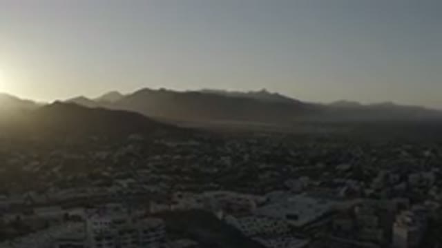 LOS CABOS MEXICO-2020: The Sun Rising Over The Desert Landscape Early In The