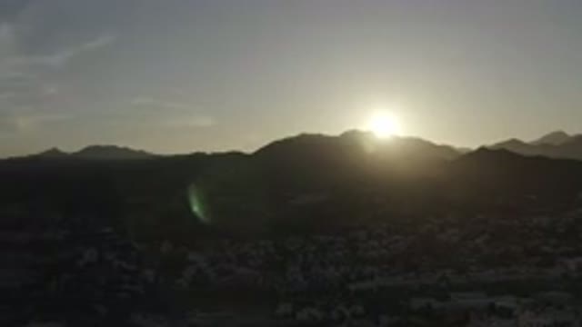 LOS CABOS MEXICO-2020: A View Of The Sunrise With Mountains And Rocks Shown