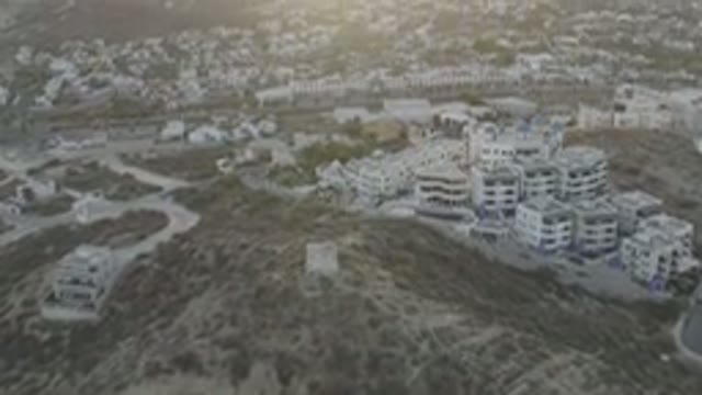 LOS CABOS MEXICO-2020: Moving Topside View Of A Wide Town With Lot Of Buildings
