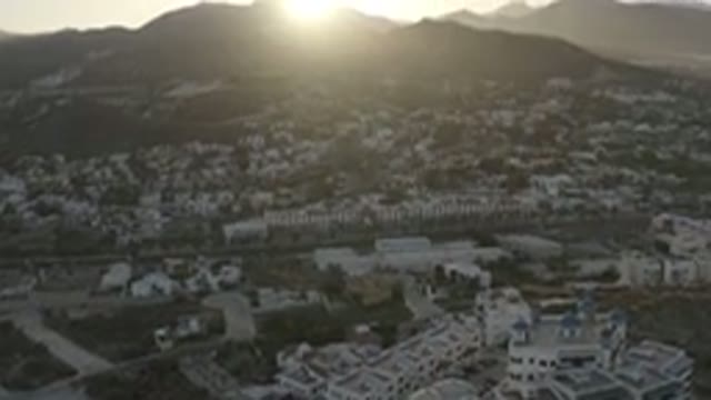 LOS CABOS MEXICO-2020: A Large Scattered White Buildings In The Valley Of A