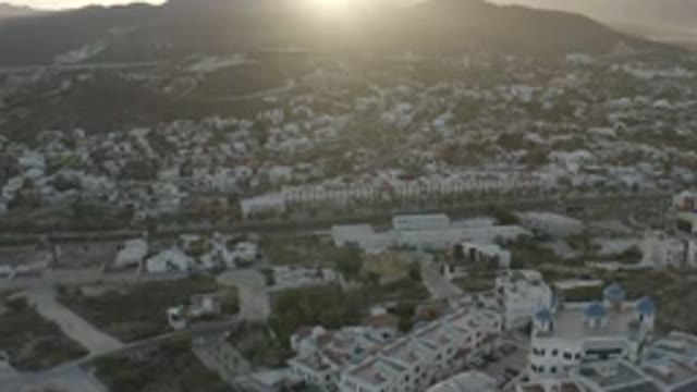 LOS CABOS MEXICO-2020: Beautiful Tall And Short Buildings Sitting On The Hillside