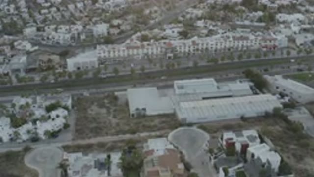 LOS CABOS MEXICO-2020: A Highway With Vehicular Traffic Runs Through An Urban Area