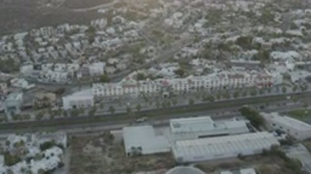 LOS CABOS MEXICO-2020: Overhead View of City With Traffic and White Buildings Near