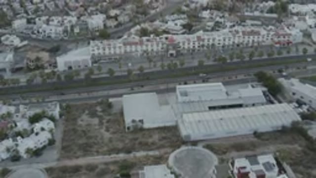LOS CABOS MEXICO-2020: Big Buildings Surrounding The City And Cars Are