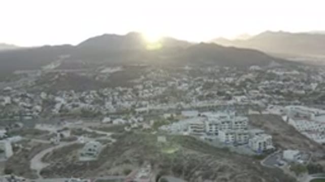 LOS CABOS MEXICO-2020: A Big Town With White Box Type Buildings And Houses In