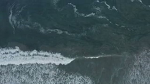 LOS CABOS MEXICO-2020: Aerial Shot Of A Dark Blue Ocean Forming Waves That