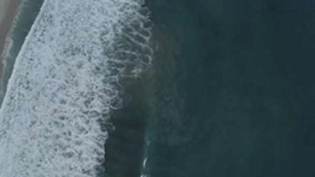 LOS CABOS MEXICO-2020: Top View Of A Beach With Big White Bubbled Wave On It
