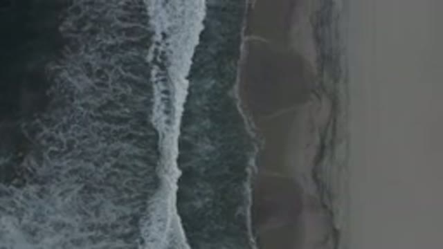 LOS CABOS MEXICO-2020: Aerial View Of The Tide Rolling In On A Beach