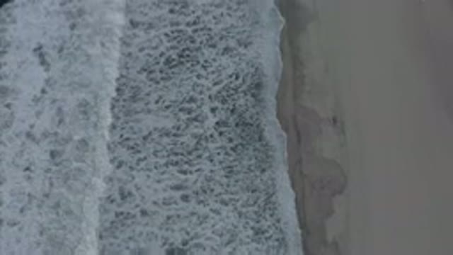 LOS CABOS MEXICO-2020: Rolling Waves Of Gentle White Caps Breaking Onto The