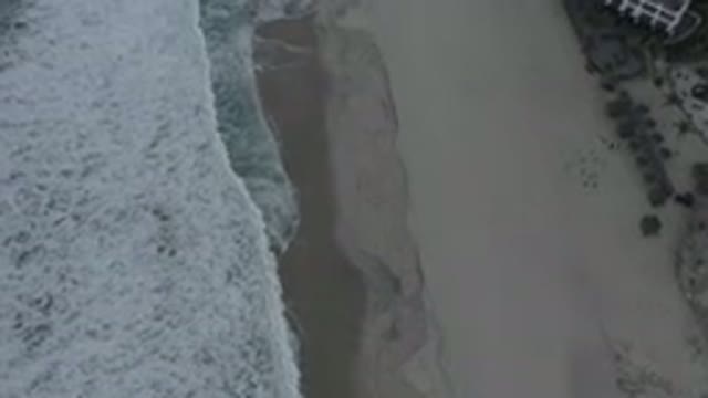 LOS CABOS MEXICO-2020: Straight Top View Of A Beach With Gentle White Bubble