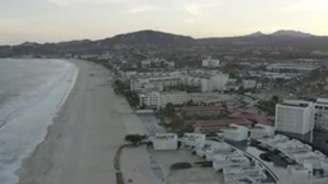 LOS CABOS MEXICO-2020: Overhead Flying Shot Of A Beachside Community