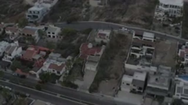 LOS CABOS MEXICO-2020: Drone Shot Of Houses And Streets During Time Of Day With Warm Light