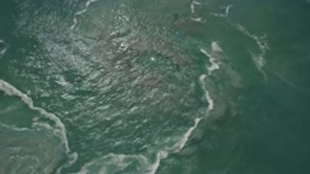 SAN JOSE DEL CABO MEXICO-2020: Top View Of Greenish Water With Light Waves