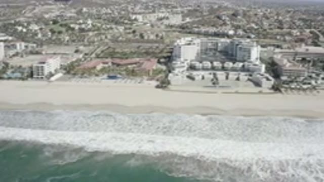 SAN JOSE DEL CABO MEXICO-2020: Aerial View Panning Over Beach With Hotels