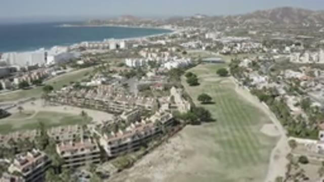 SAN JOSE DEL CABO MEXICO-2020: Aerial View of Houses Parks Sea From Plane