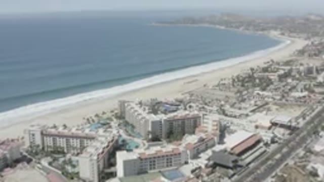SAN JOSE DEL CABO MEXICO-2020: A View Of The Ocean Shore Beach Buildings And Roads