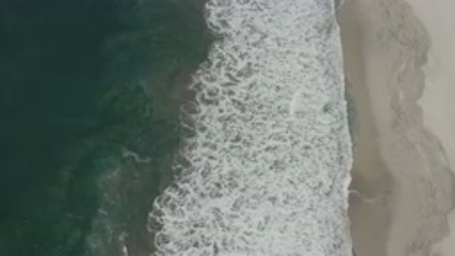 SAN JOSE DEL CABO MEXICO-2020: Aerial View Of Gentle Waves Crashing On Empty Beach