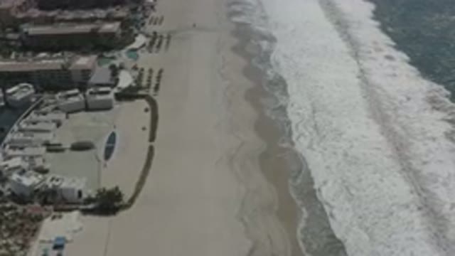 SAN JOSE DEL CABO MEXICO-2020: Foaming Ocean Waves Crashing Along The Resort And Seashore